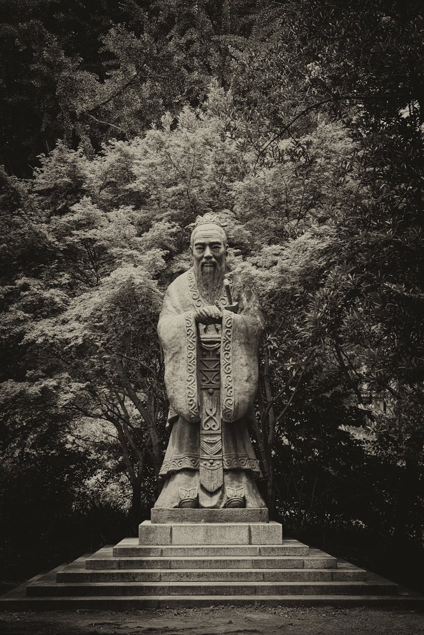grayscale photo of statue of confucius