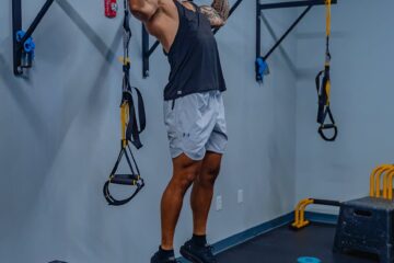 man in black tank top working out