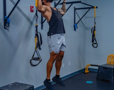 man in black tank top working out